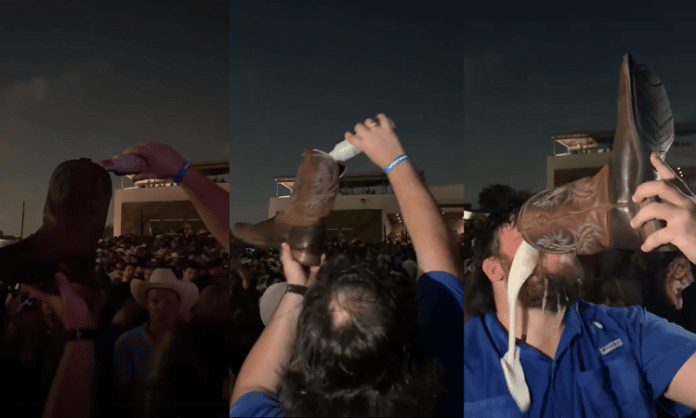 jay arnold drinks beer from his boot at turnpike troubadours concert in houston texas