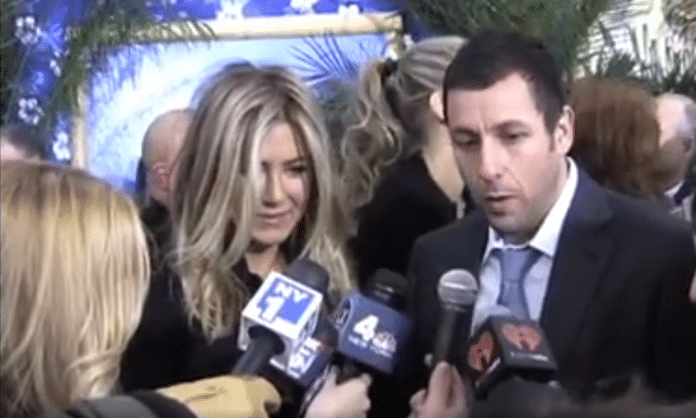 jennifer aniston and adam sandler discover a gigantic australian reporter